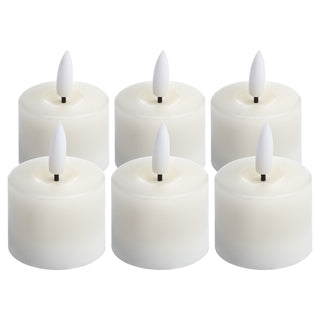 Six white LED tea light candles arranged in two rows on a plain background.