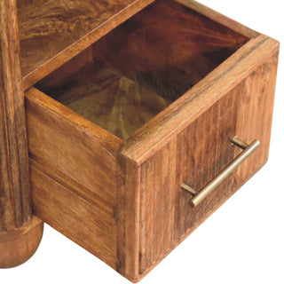 Close up of the open wooden drawer, showing the internal construction and the brass bar handle detail.