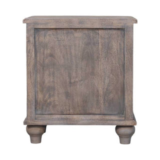 Rear view of the distressed grey nightstand showing the framed back panel and turned feet.