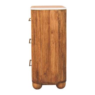 Narrow side profile of the wooden chest showing vertical panelling, rounded base, marble top edge, and bun feet.