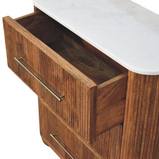 Angled close-up showing the top drawer pulled open, revealing the wooden interior and brass handle.