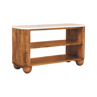 Three-quarter view of the wooden bench with white marble top, featuring fluted sides and ball feet.
