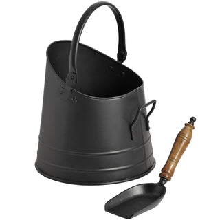 Black coal bucket and separate shovel with turned teak handle, studio shot.