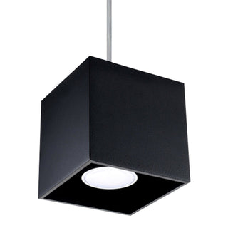 Plain black cubic pendant light fixture suspended by a silver cable on a white background.