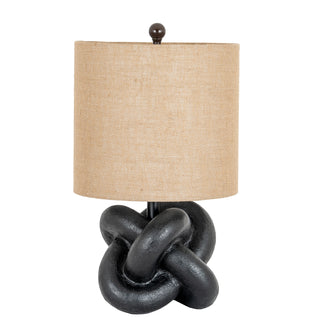 Plain front-on studio shot of the black knot table lamp and natural hessian shade.