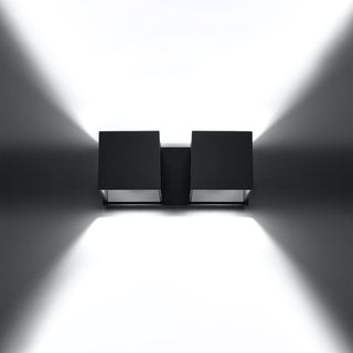 Black wall lamp demonstrating the up-and-down wash lighting effect on a white wall.