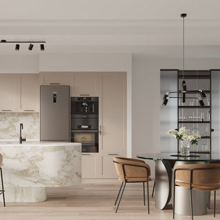 Black six-spot track light installed on the ceiling of a modern kitchen over a marble island.