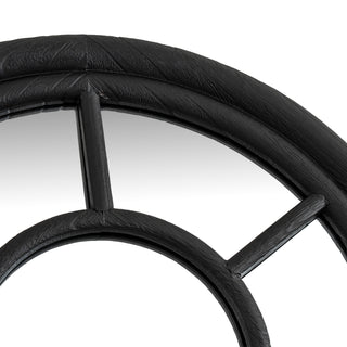 Extreme close-up of the black wood frame and the internal grid joint, showing the textured finish.