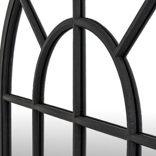 Close-up of the black wood arched mirror grid, focusing on the curved upper divisions.