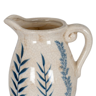 Close up of the jug's rim, handle, and crackle glaze texture with blue leaf design.