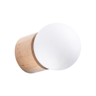 Cylindrical light wood wall lamp mount with a protruding frosted white glass globe shade.