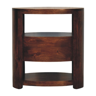Front-on view of the curved dark wood bedside table with two open storage shelves separated by a solid central panel.