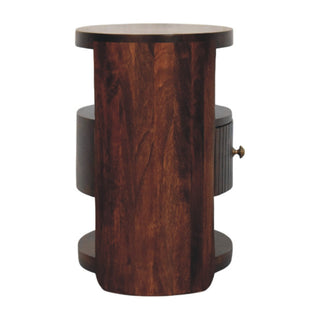 Side view of the dark wood bedside table, highlighting the curved central panel and deep wood grain.