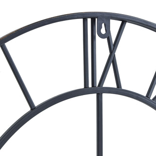 Close-up of the distressed bronze frame showing the keyhole hanging fixture.