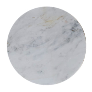 Overhead view of the circular white marble tabletop showing grey and gold veining.