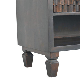 Close-up of the dark wood bench base showing the turned feet and the open lower storage compartment.