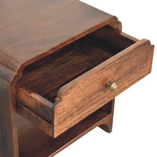 Close-up of the dark walnut bedside table showing the drawer pulled open, revealing the interior storage depth.
