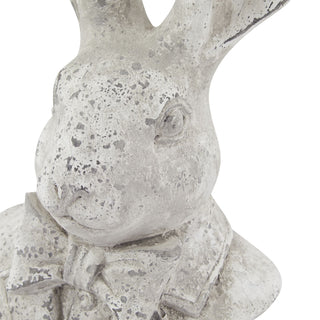 Close detail of the grey ceramic hare's face, showing the textured finish and bow tie.