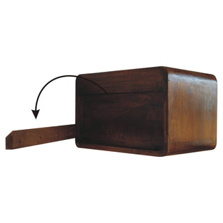 Detail of the chestnut bedside unit showing the separate wooden wall mounting bracket and assembly indicator arrow.