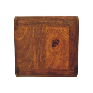 Top-down view of the chestnut floating bedside unit, showing the rounded edges and central wood panel construction.