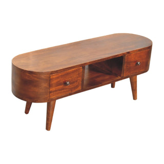 Three-quarter view of the chestnut media unit showing the oval top, two drawers, open shelf, and tapered legs.