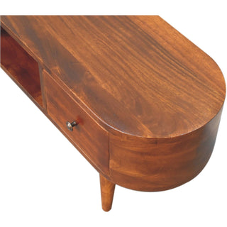 High-angle detail of the unit's rounded end, highlighting the polished chestnut surface and wood grain.