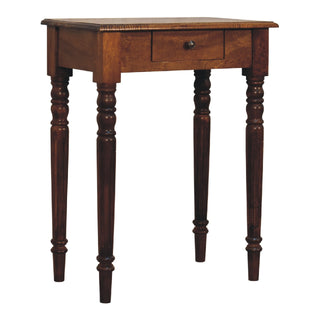 Chestnut writing desk showing the single drawer and four turned legs in a studio shot.