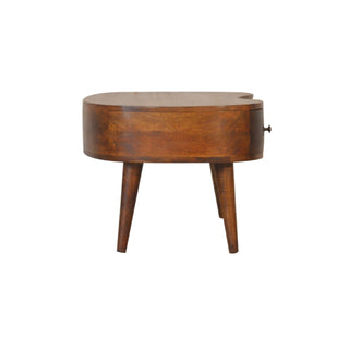 Profile view of the chestnut coffee table on a white background, showing the rounded shape and angled legs.
