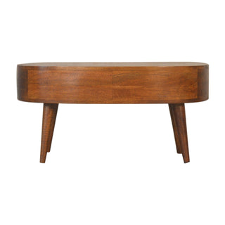 Straight-on view of the chestnut coffee table, highlighting the seamless curved front and tapered wooden legs.