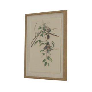 Angled view of framed linen artwork showing a botanical illustration of two chickadees on branches.