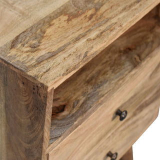 Close detail of the oak-ish wood grain on the top surface and inside the open shelf.
