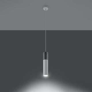 Concrete and white cylindrical pendant lamp illuminated, showing the downward spotlight effect.