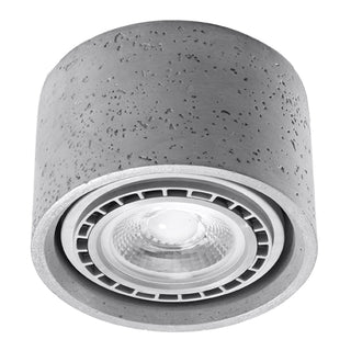 Grey cylindrical concrete ceiling lamp fixture shown slightly angled, revealing the recessed spotlight.