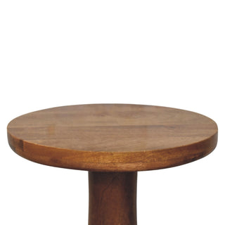 Close-up detail of the round wooden tabletop showing the smooth surface and thick edge profile.