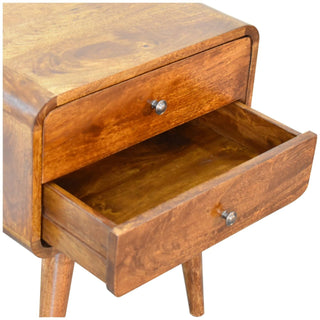 Curved chestnut bedside table detail showing the lower drawer open and the internal construction.