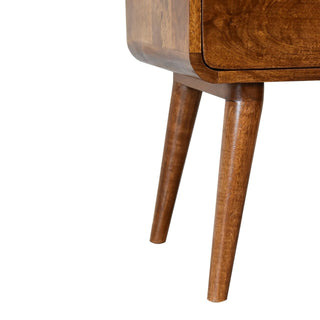 Detail showing the attachment of the angled, tapered legs to the curved chestnut cabinet base.