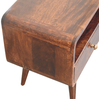 Close-up of the media unit showing the rich walnut wood grain, curved side panel, and tapered leg.
