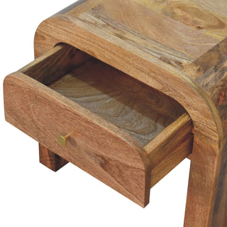 Close-up showing the Darcy bedside drawer pulled open, revealing the interior of the drawer box.