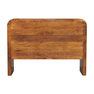 Rear view of the chestnut drawer chest, showing the solid wood back panel, prominent grain, and rounded top corners.