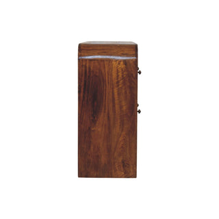 Side view of the chestnut drawer chest, highlighting the depth and rounded top edge.