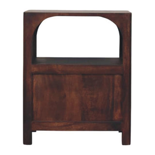 Back view of the dark wood bedside table showing the arched recess and solid lower panel.