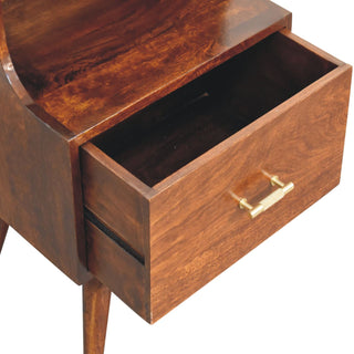 Close-up of the dark wood bedside table with the drawer partially open, showing the internal storage space.