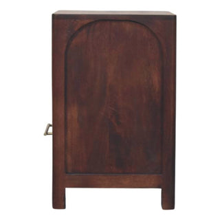 Dark wood bedside table side view showing the recessed panel detail with an arched top.