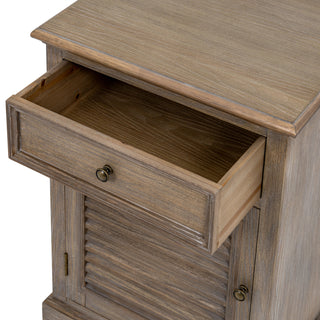 View of the Delphine chest with the top drawer open, showing the internal construction and distressed wood texture.
