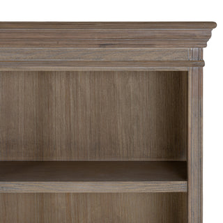 Detail shot showing the top right corner, featuring the decorative cornice and wood grain texture.