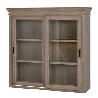 Plain front-on studio shot of the wooden dresser top with sliding glass doors and cornice detail.
