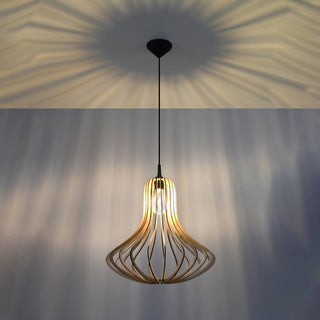 Pendant lamp illuminated, casting a striking radial shadow pattern on the ceiling.