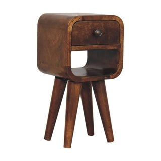 Close view highlighting the dark chestnut wood grain, curved body, and small metal drawer handle.