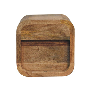 Straight-on front view of the curved oak-ish bedside unit, showing the prominent wood grain and open slot.