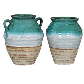 Amphora vase with handles displayed next to a handle-less vase, both featuring turquoise, white, and beige glazes.